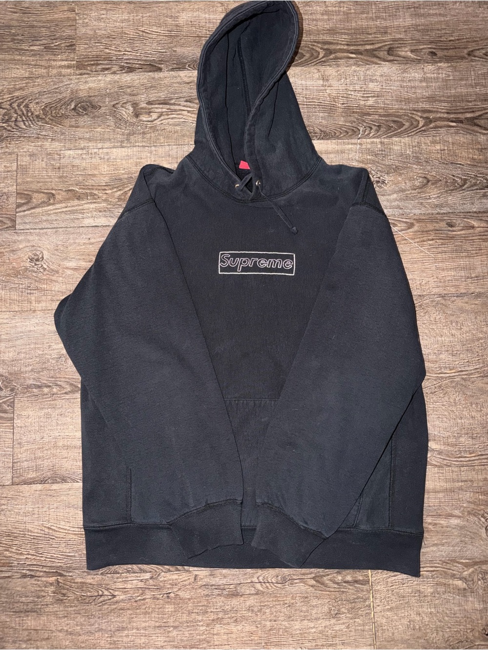 Supreme Black Hoodie with Red Tag and White Embroidery